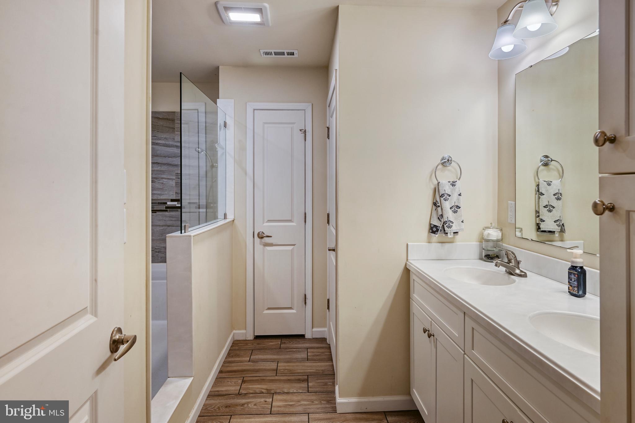 1176 Signboard Road Bumpass, VA 23024 - Photo 32 of 45 Primary Bathroom with Double vanities