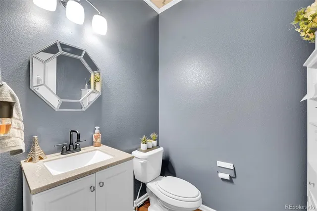 a utility room with sink dryer and washer