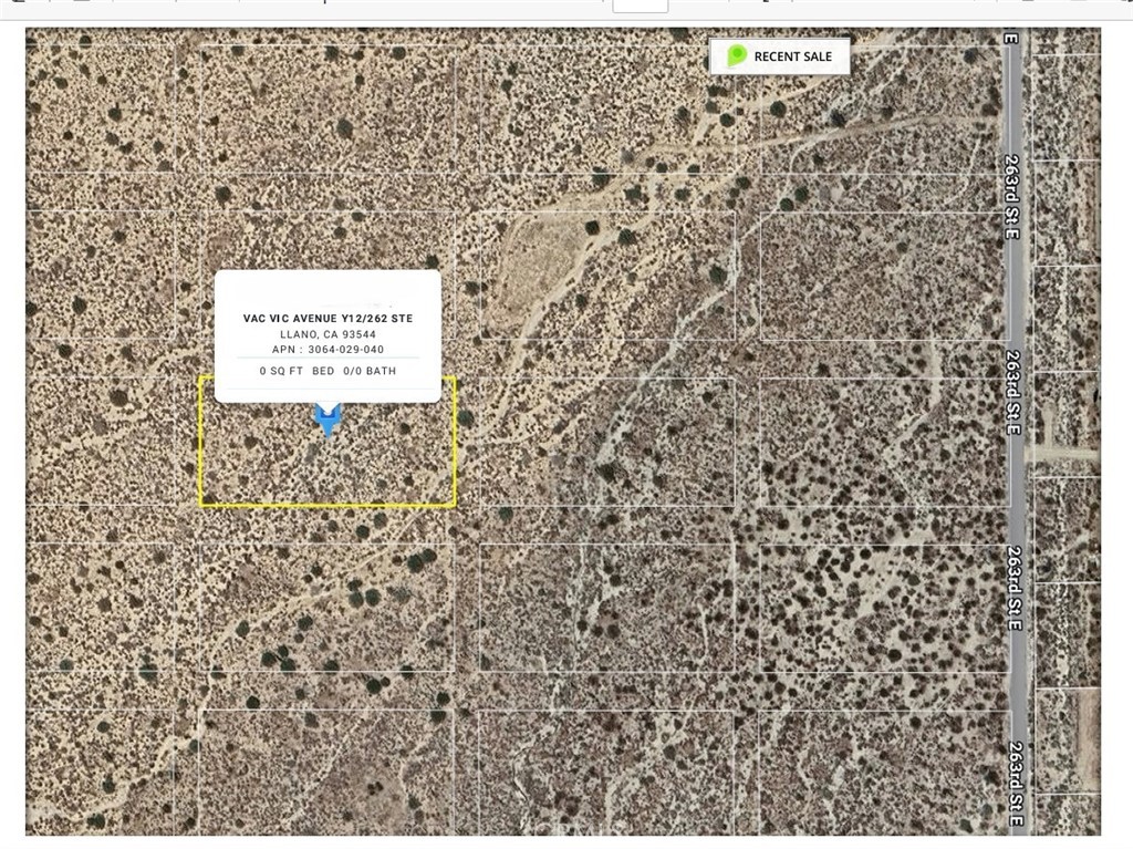 0 Vic Avenue Llano, CA 93544 - Photo 1 of 3 a sign on a refrigerator