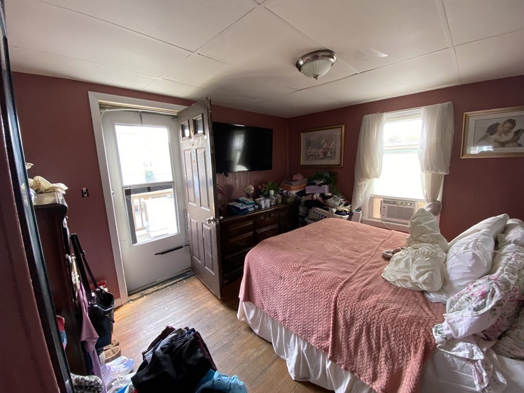 3 Chestnut Street Dudley, MA 01571 - Photo 12 of 20 a bedroom with a bed window and dresser