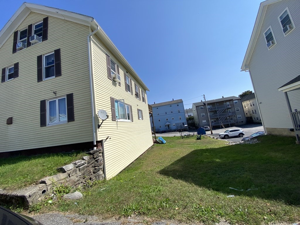 3 Chestnut Street Dudley, MA 01571 - Photo 17 of 20 a house view with a garden space