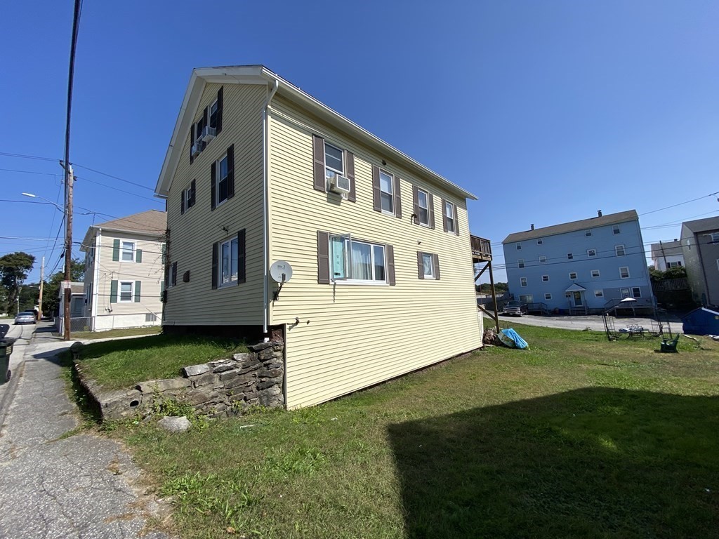 3 Chestnut Street Dudley, MA 01571 - Photo 2 of 20 a view of a house with backyard