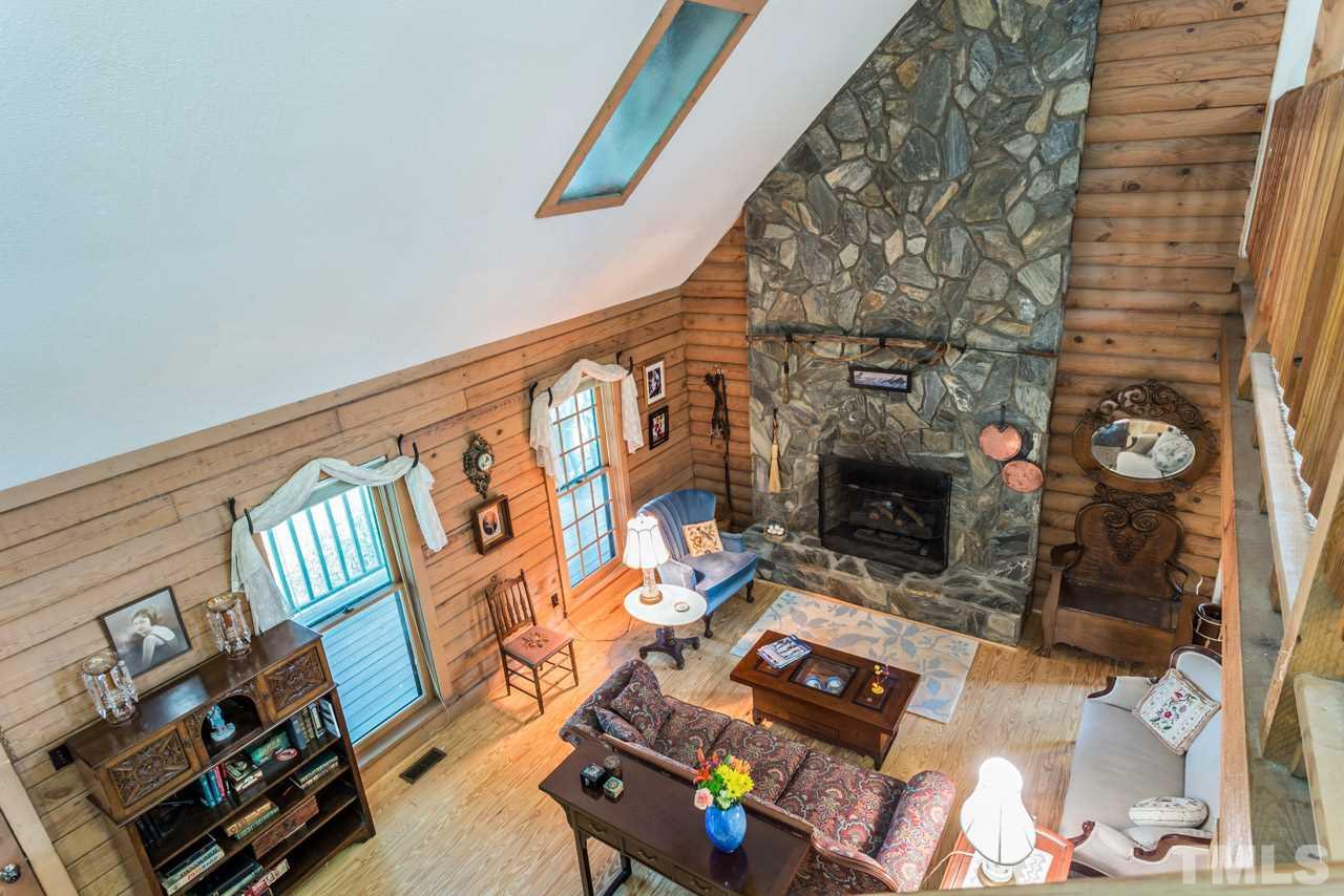 11816 Possum Track Road Raleigh, NC 27614 - Photo 19 of 25 a view of living room with furniture and a fireplace