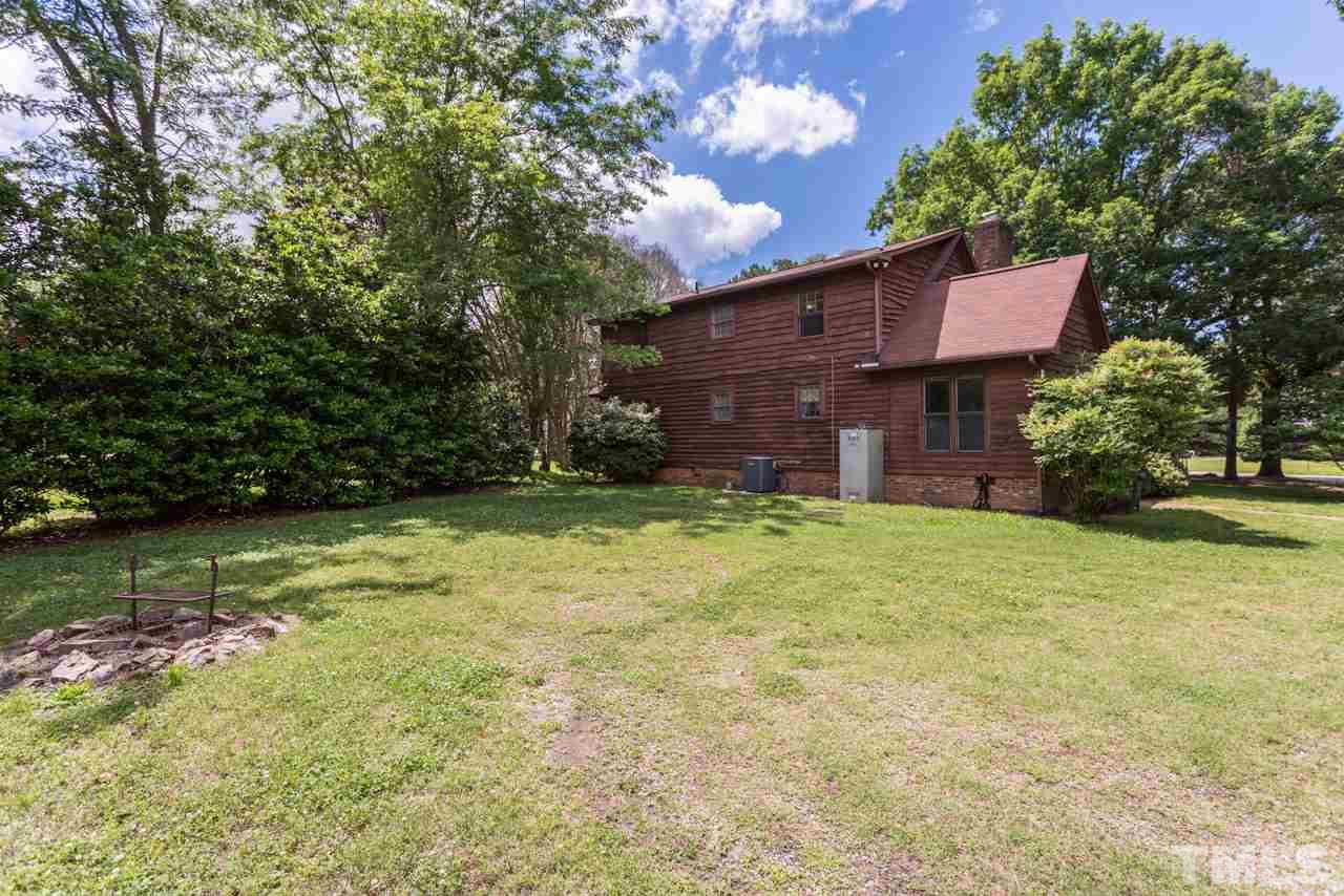 11816 Possum Track Road Raleigh, NC 27614 - Photo 25 of 25 a house view with a garden space