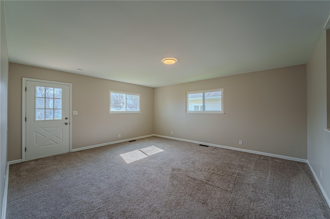 1005 Burt Street Springfield, OH 45505 - Photo 9 of 33 This versatile room features ample natural light and plush carpeting, ready for your personal touch.