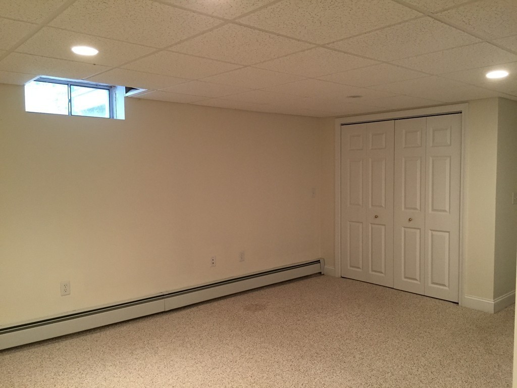 8 Autumn Woods Drive, Unit 8 Rutland, MA 01543 - Photo 14 of 16 a view of an empty room