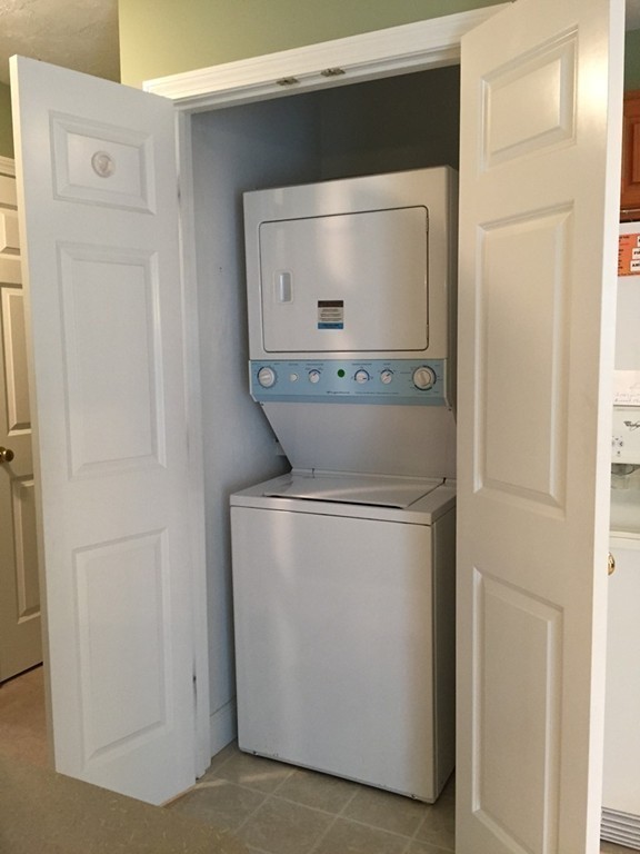 8 Autumn Woods Drive, Unit 8 Rutland, MA 01543 - Photo 8 of 16 a utility room with dryer and washer