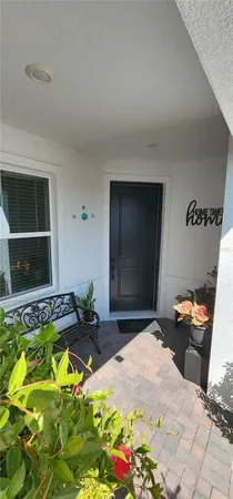 a bed room with a bed and a flat screen tv