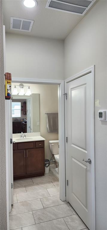 1823 Spring Shower Circle Kissimmee, FL 34744 - Photo 17 of 38 a room with furniture and a chandelier