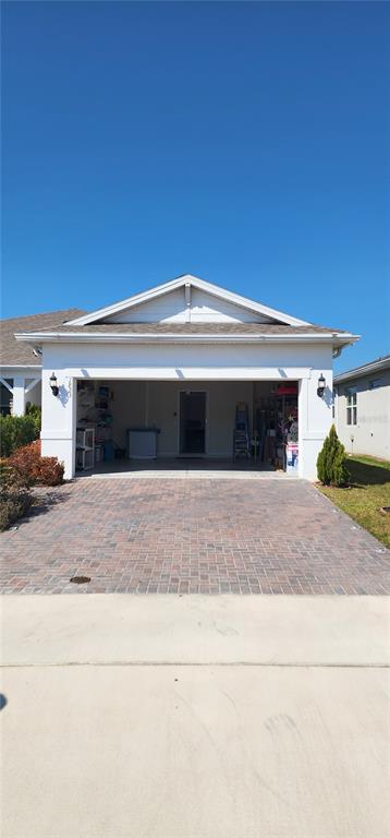 1823 Spring Shower Circle Kissimmee, FL 34744 - Photo 2 of 38 a front view of a house with a yard