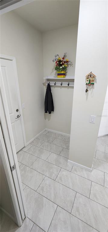 1823 Spring Shower Circle Kissimmee, FL 34744 - Photo 28 of 38 a bathroom with a sink and toilet