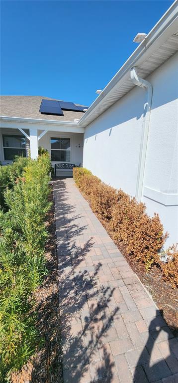 1823 Spring Shower Circle Kissimmee, FL 34744 - Photo 34 of 38 a front view of a house with a yard