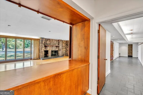 a view of a room with a large window