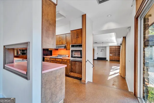 a view of kitchen and living room