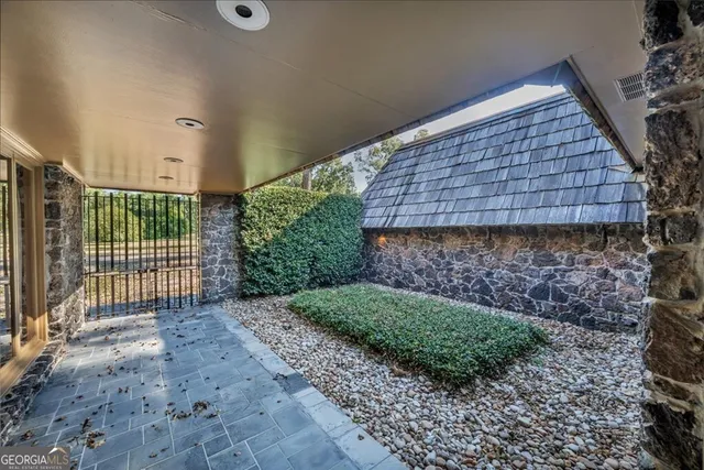 a backyard of a house with lots of green space