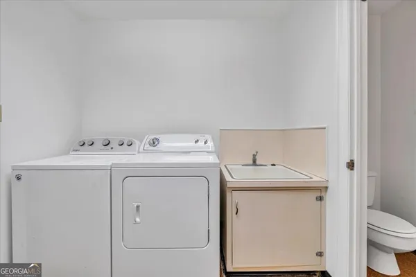 a view of a house with a tree