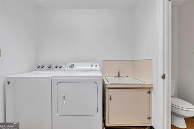 a view of a house with a tree