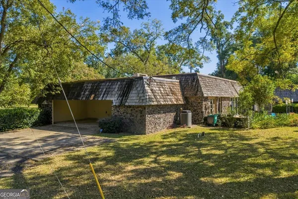 a view of a backyard of a house