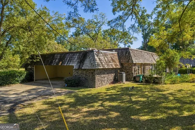 a view of a backyard of a house