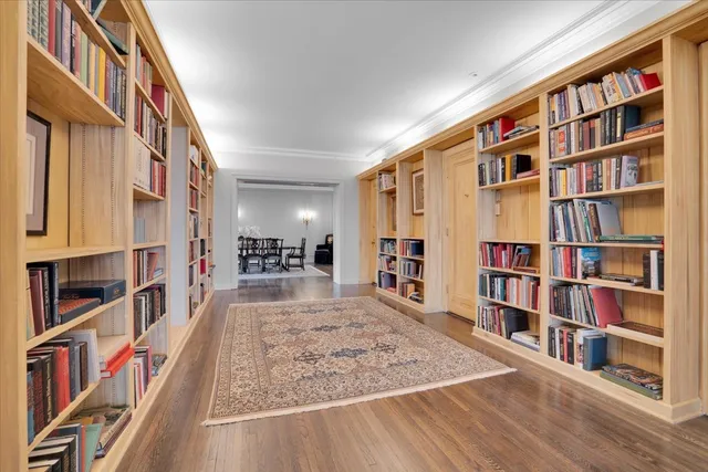 a view of an empty room with furniture