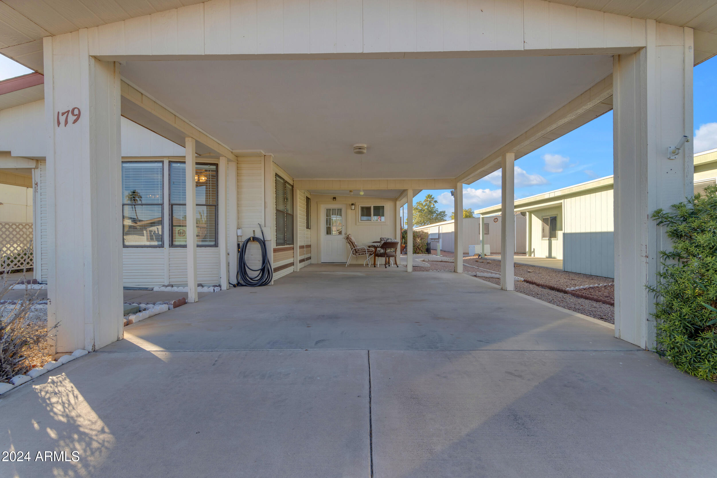 3500 South Tomahawk Road, Unit 179 Apache Junction, AZ 85119 - Photo 4 of 37 Carport