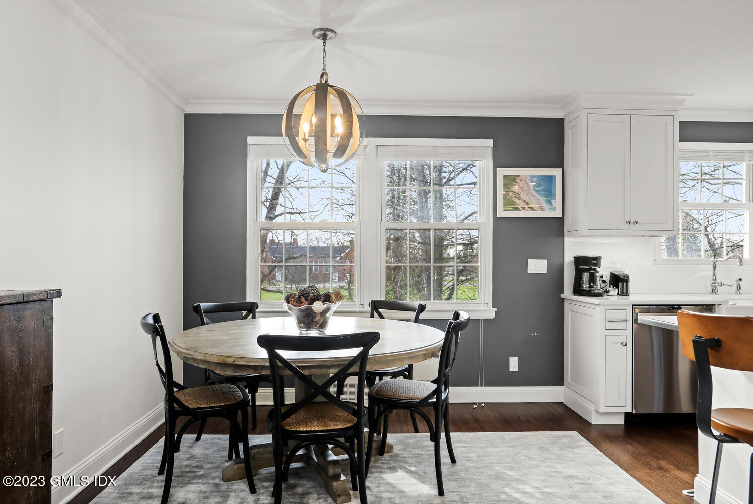 140 Putnam Park, Unit 140 Greenwich, CT 06830 - Photo 3 of 15 a view of a dining room with furniture window and wooden floor