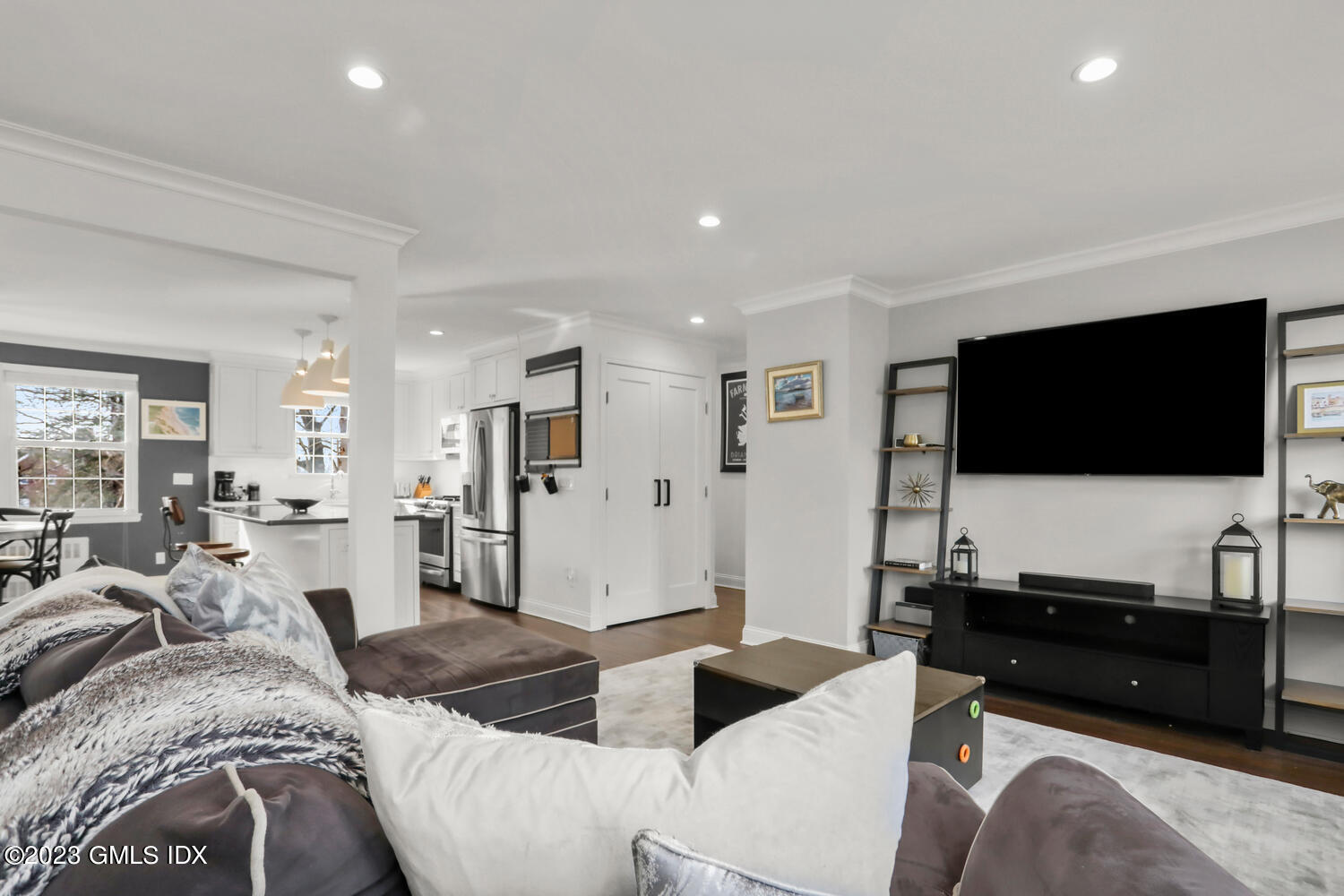 140 Putnam Park, Unit 140 Greenwich, CT 06830 - Photo 5 of 15 a living room with furniture and a flat screen tv