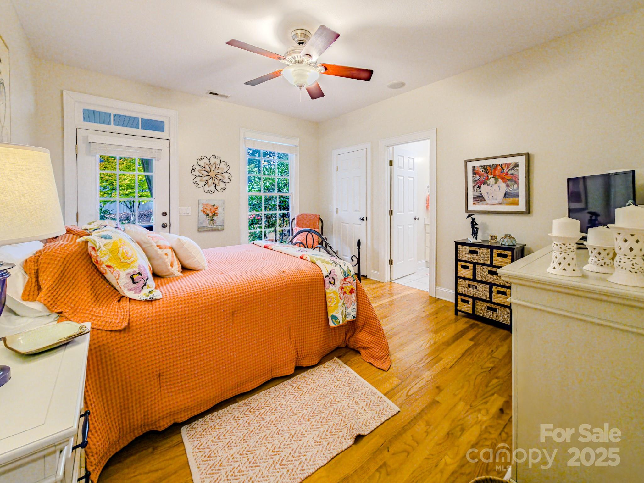 134 Chisholm Trail Rutherfordton, NC 28139 - Photo 31 of 48 a bed room with a bed and a chandelier