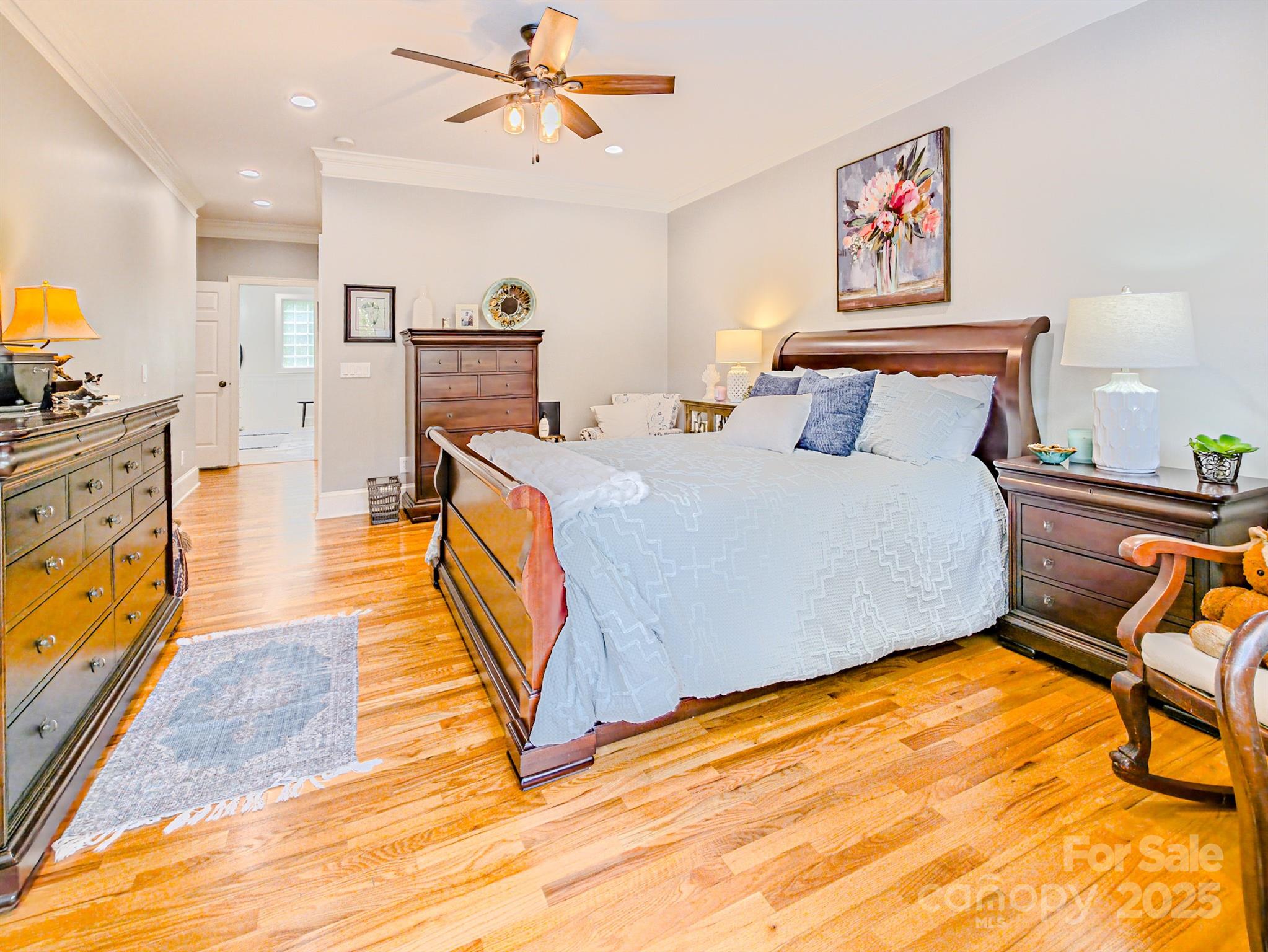 134 Chisholm Trail Rutherfordton, NC 28139 - Photo 45 of 48 a bedroom with a bed and wooden floor