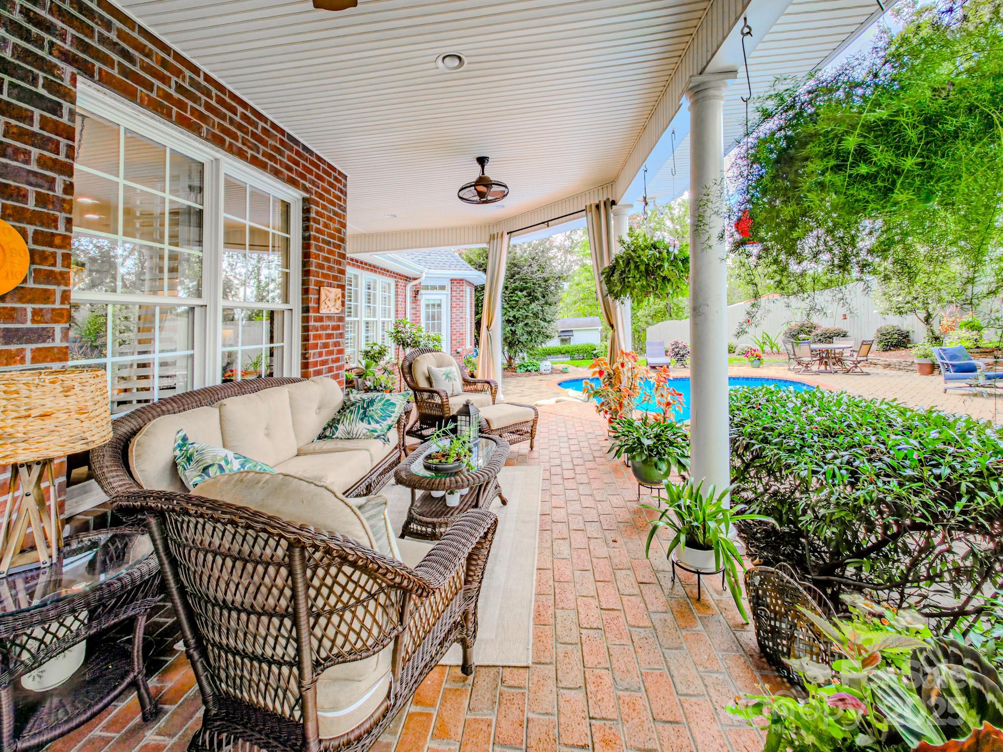 134 Chisholm Trail Rutherfordton, NC 28139 - Photo 7 of 48 a view of an chairs and table in the patio