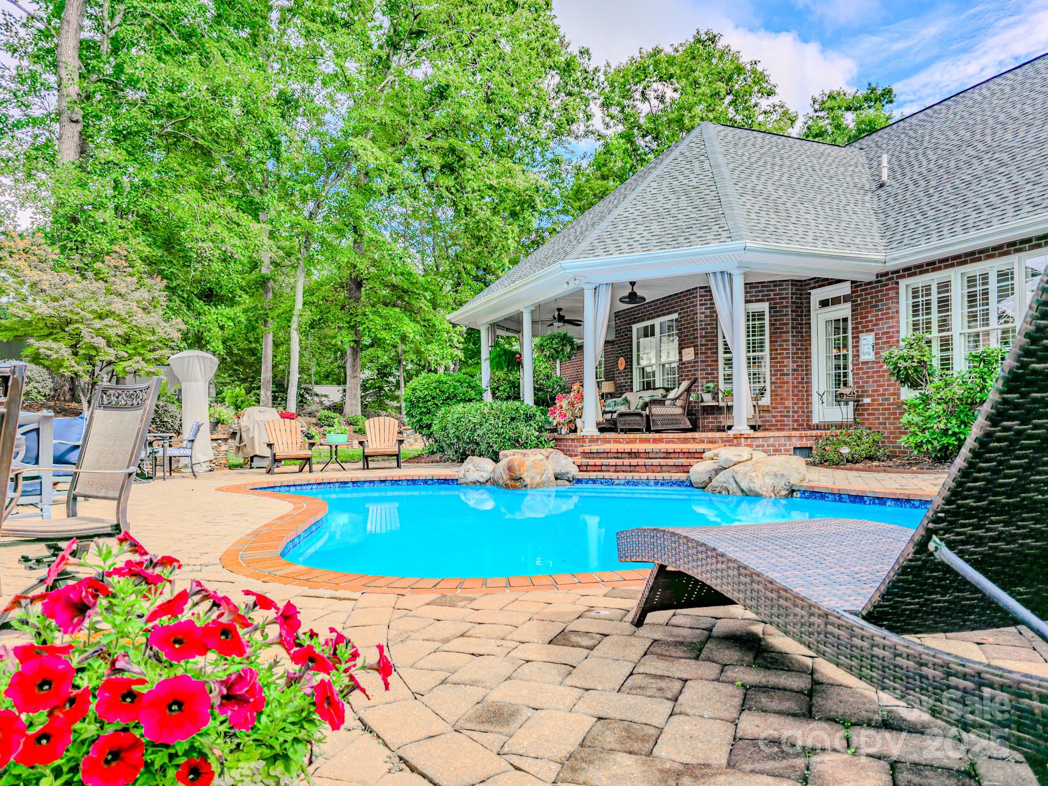134 Chisholm Trail Rutherfordton, NC 28139 - Photo 9 of 48 a view of a house with swimming pool and sitting area