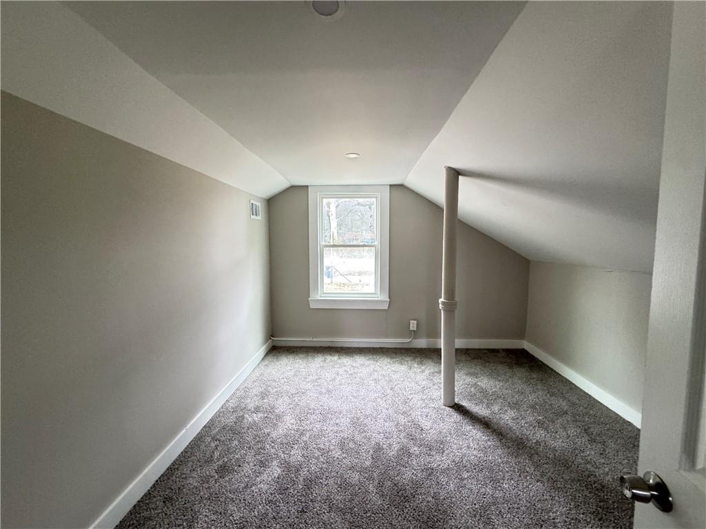 1714 Emerald Avenue Southwest Atlanta, GA 30310 - Photo 11 of 16 an empty room with windows