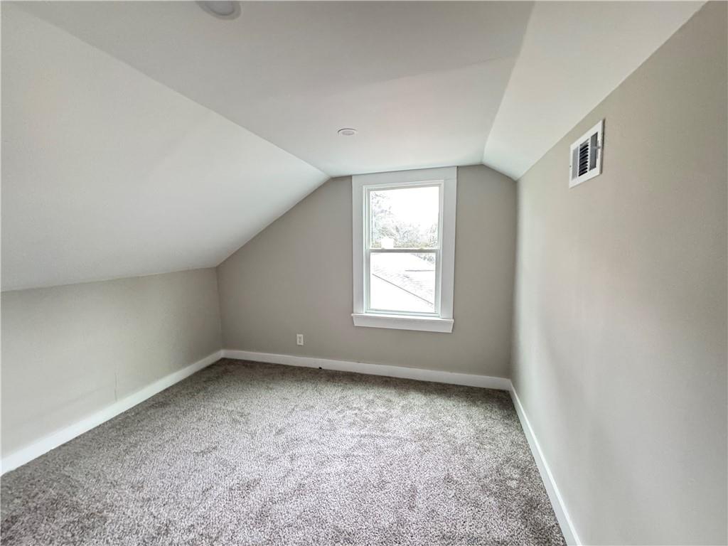 1714 Emerald Avenue Southwest Atlanta, GA 30310 - Photo 8 of 16 an empty room with a window