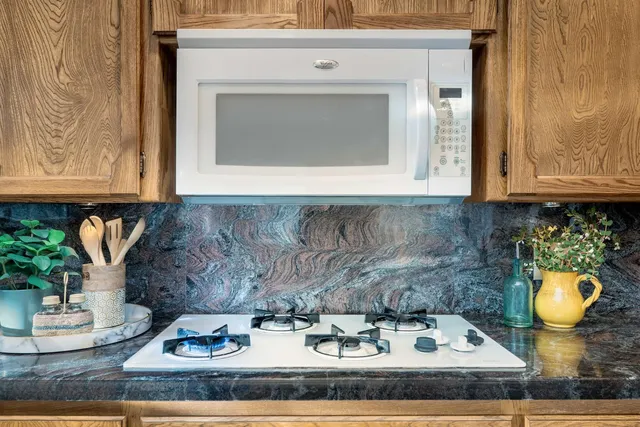 a bedroom with furniture and window