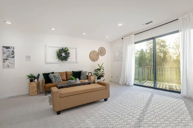 a utility room with sink dryer and washer