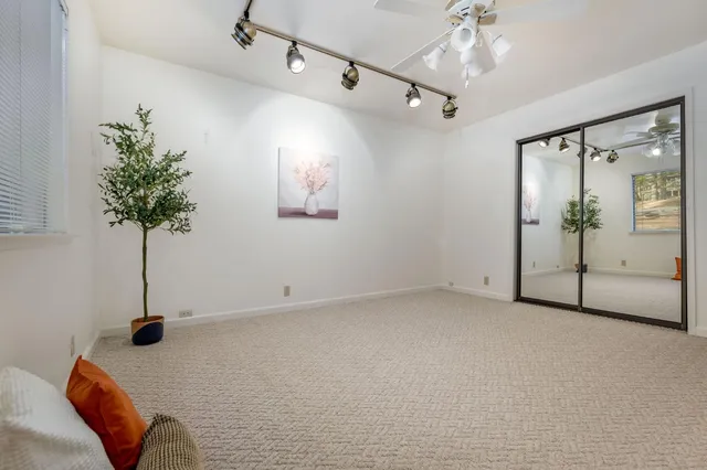a bathroom with a sink a toilet and vanity