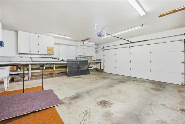 a view of a yard with large trees