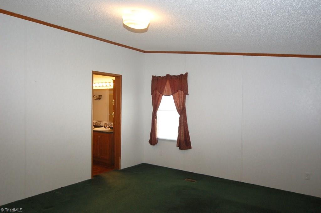 3401 Ridge Road Lexington, NC 27295 - Photo 15 of 30 Master bedroom has private bath and walk in closet