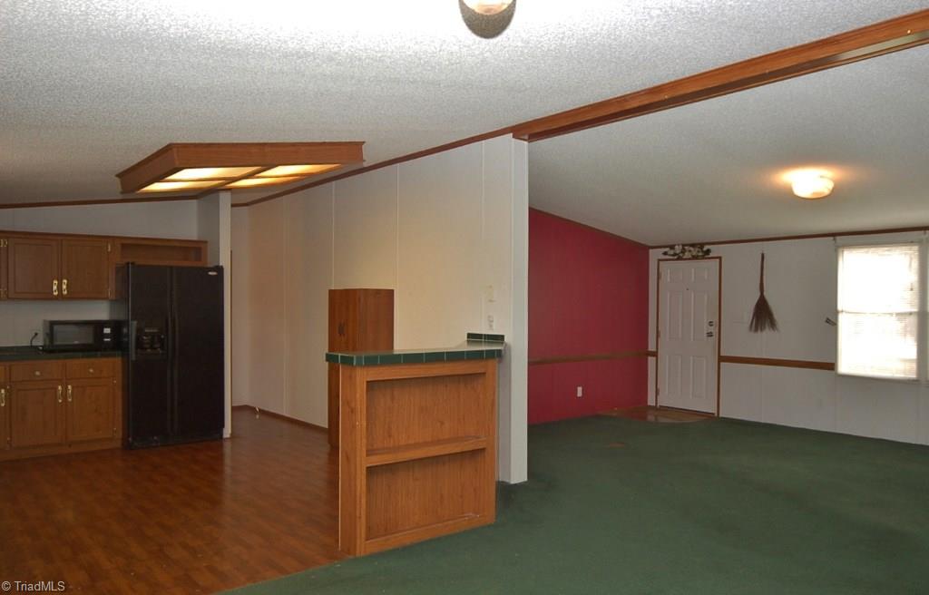 3401 Ridge Road Lexington, NC 27295 - Photo 6 of 30 Dining room is open to living room and kitchen