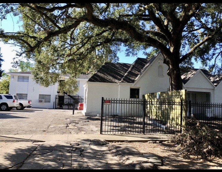 a view of a house with a snow in the yard
