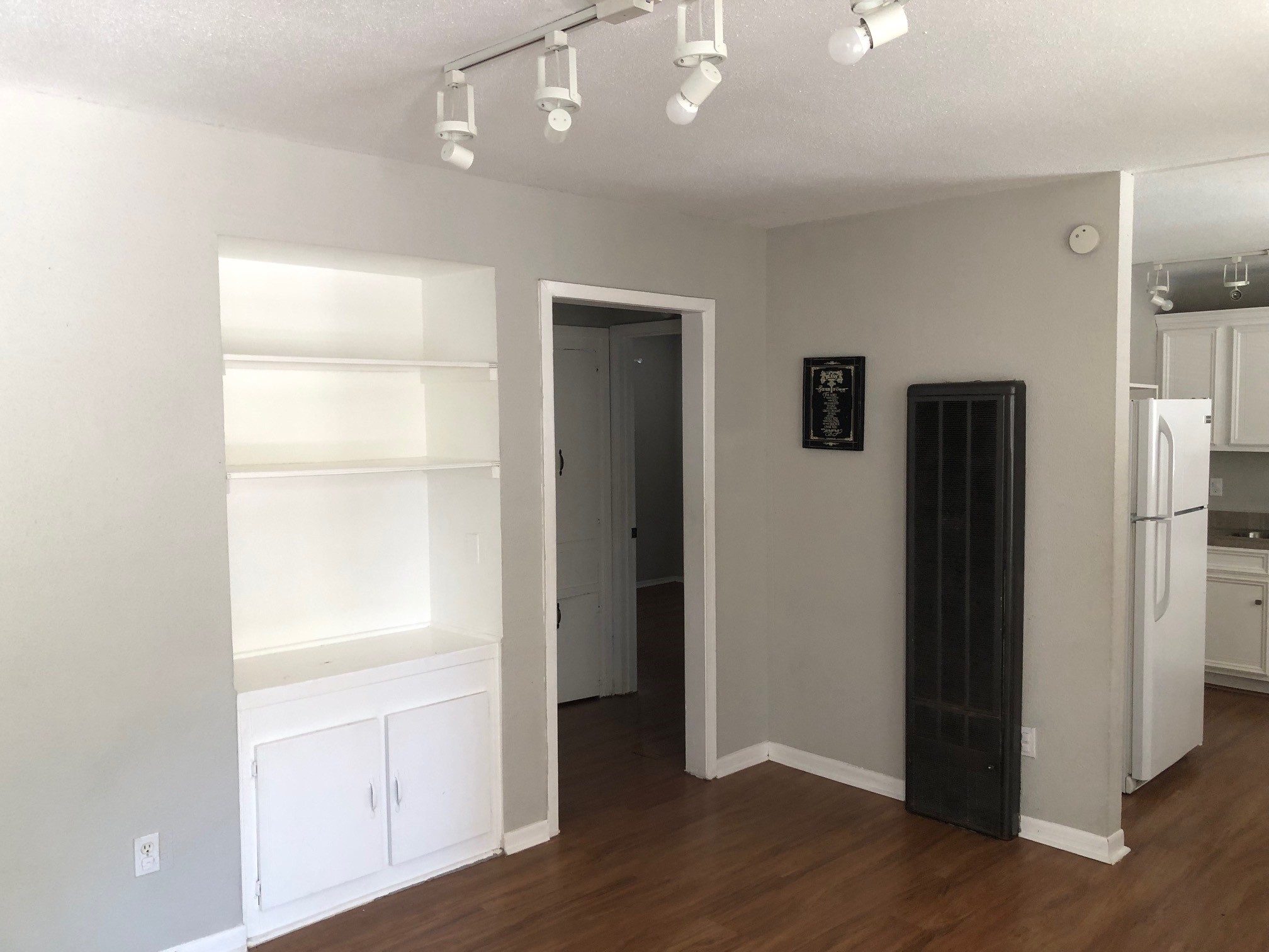 2606 Barbee Street, Unit 7 Houston, TX 77004 - Photo 3 of 8 a view of an empty room with wooden floor