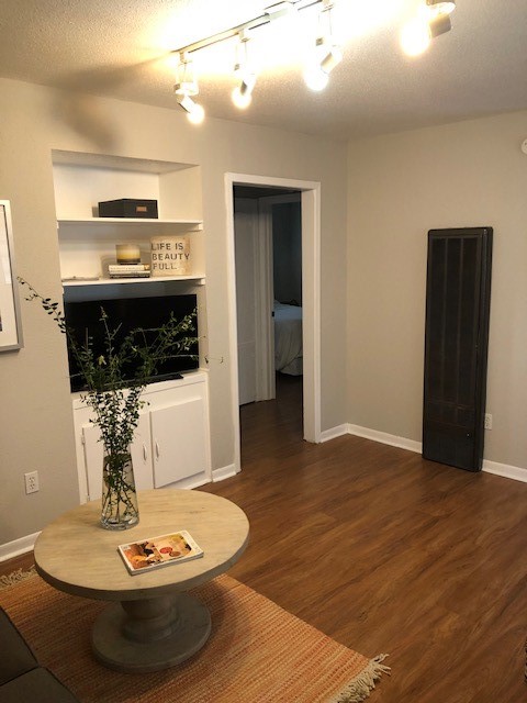 2606 Barbee Street, Unit 7 Houston, TX 77004 - Photo 7 of 8 a dining room with wooden floor