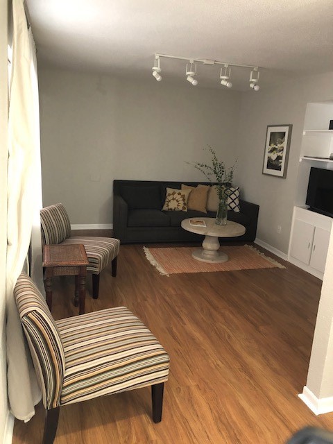 2606 Barbee Street, Unit 7 Houston, TX 77004 - Photo 8 of 8 a living room with furniture and a couch