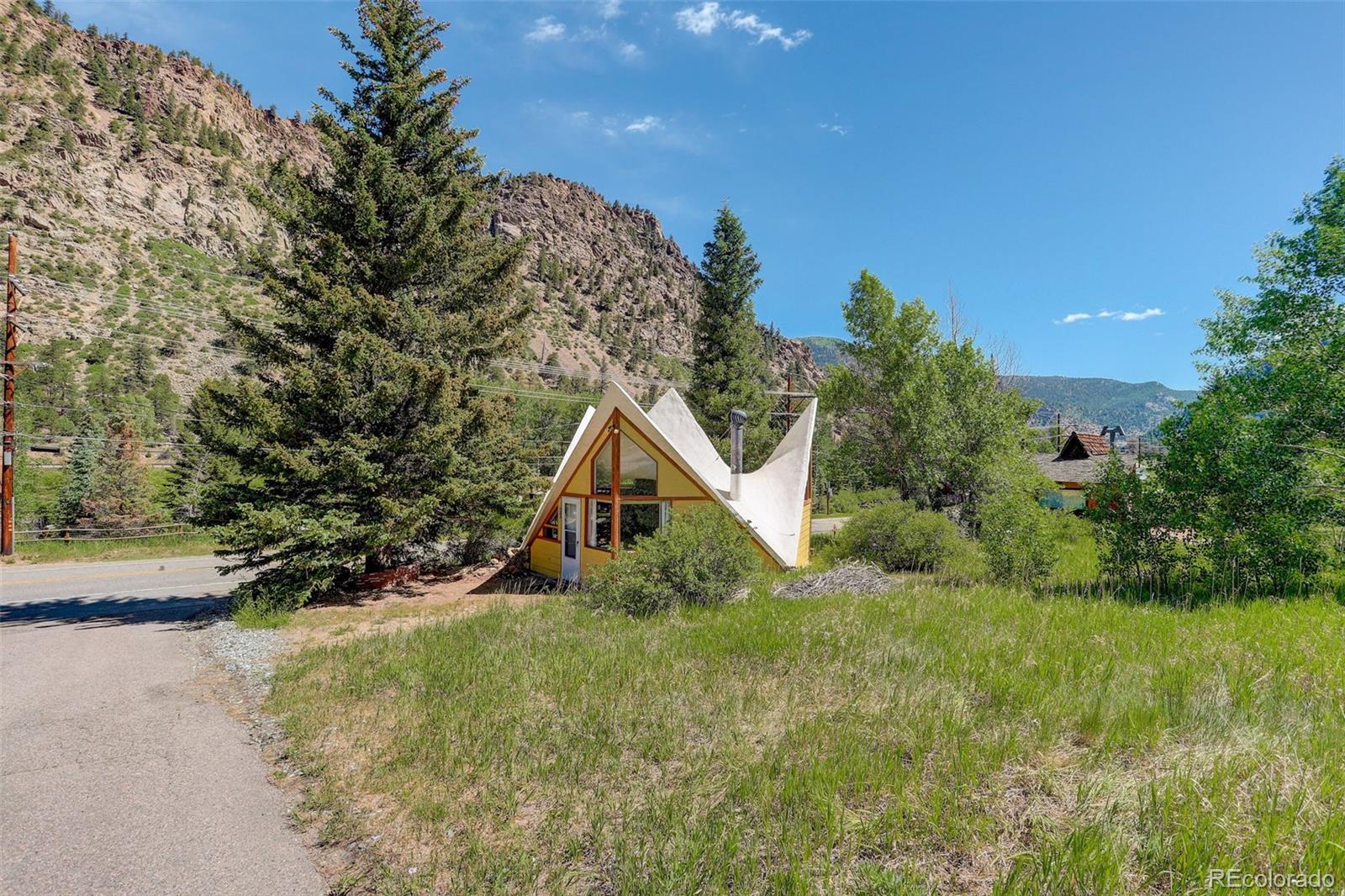 2212 Alvarado Road Georgetown, CO 80444 - Photo 15 of 19 a view of a house with a yard