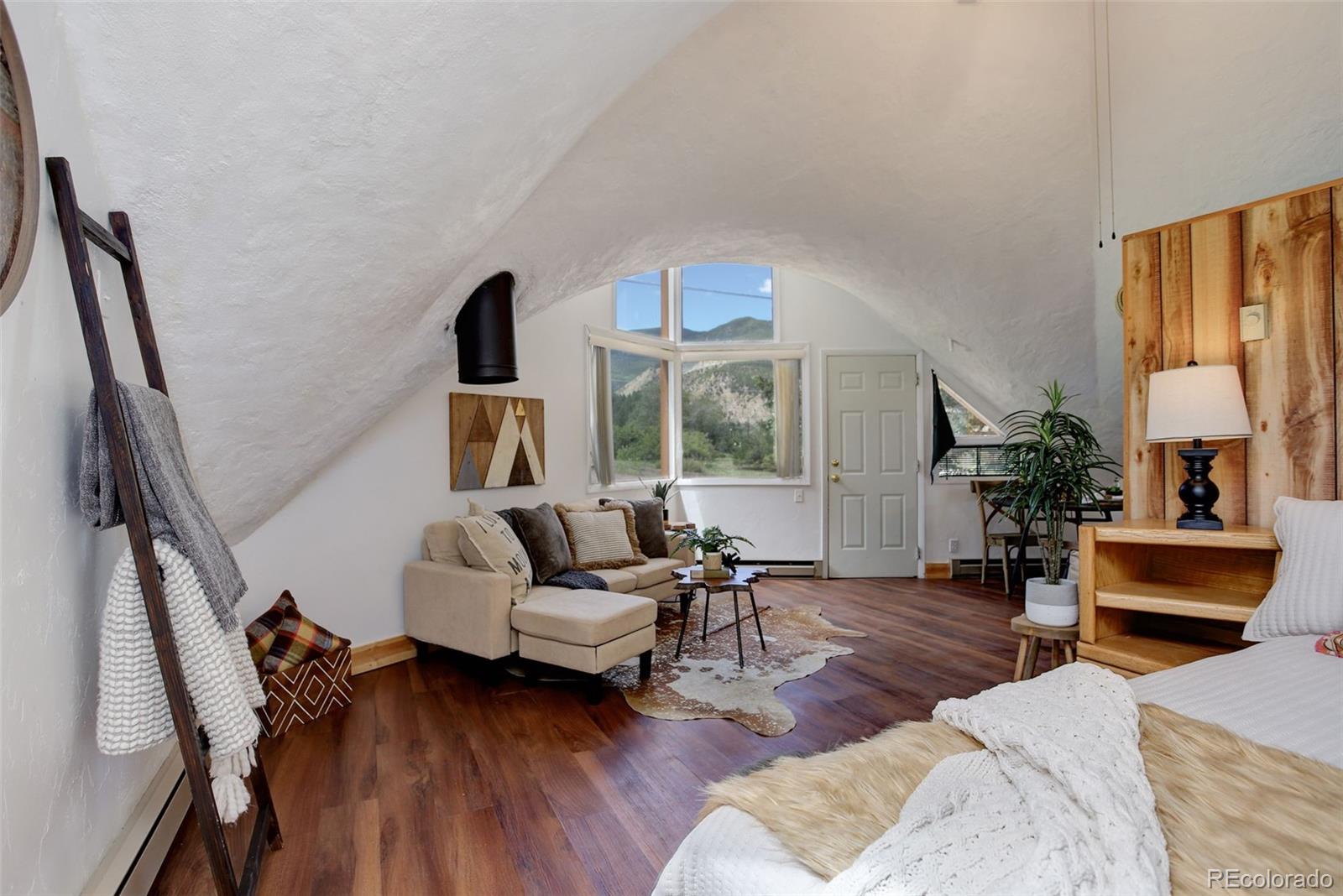 2212 Alvarado Road Georgetown, CO 80444 - Photo 10 of 19 a living room with furniture and a window