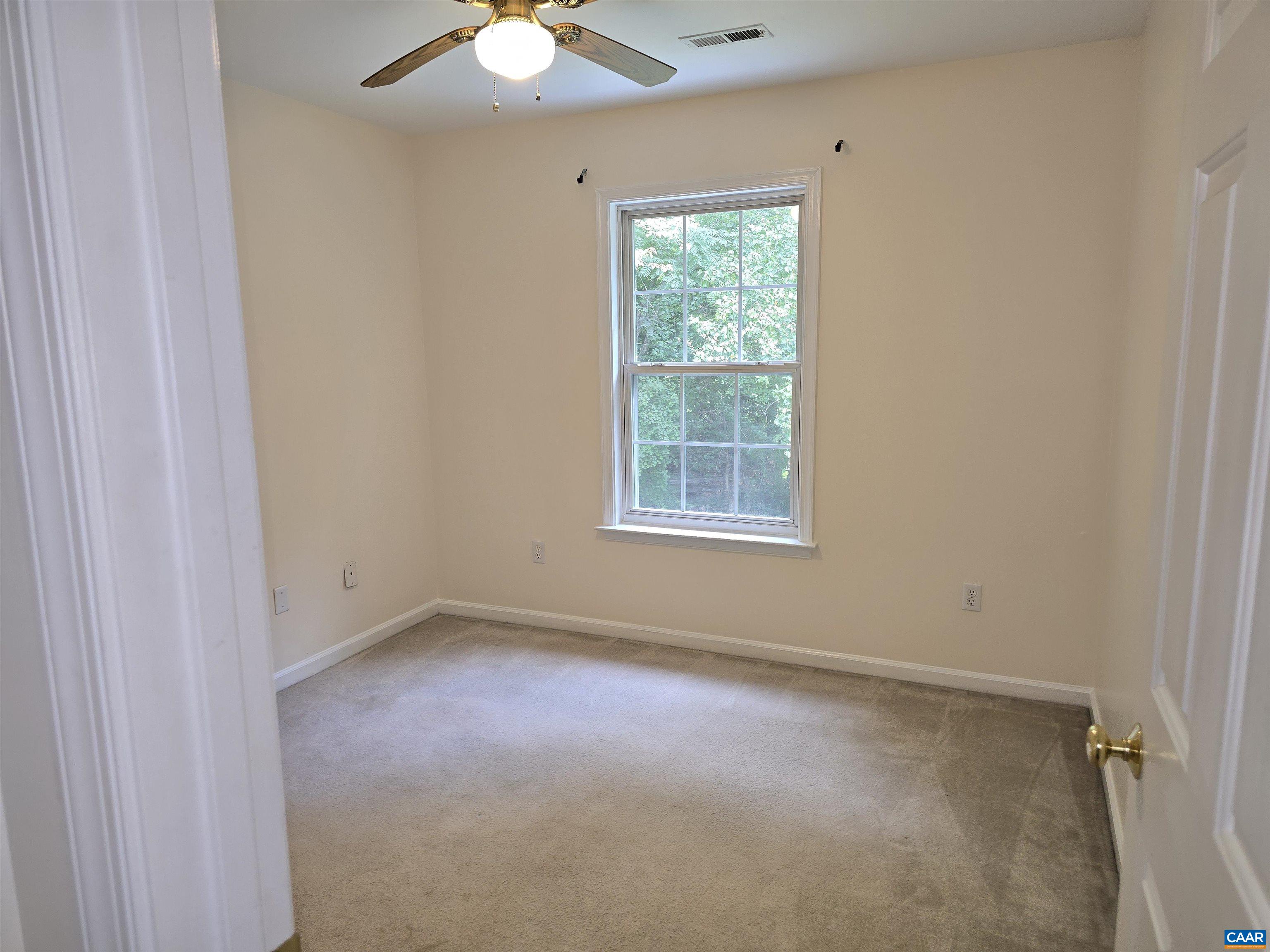 259 Spring Oaks Lane Ruckersville, VA 22968 - Photo 24 of 26 an empty room with a window