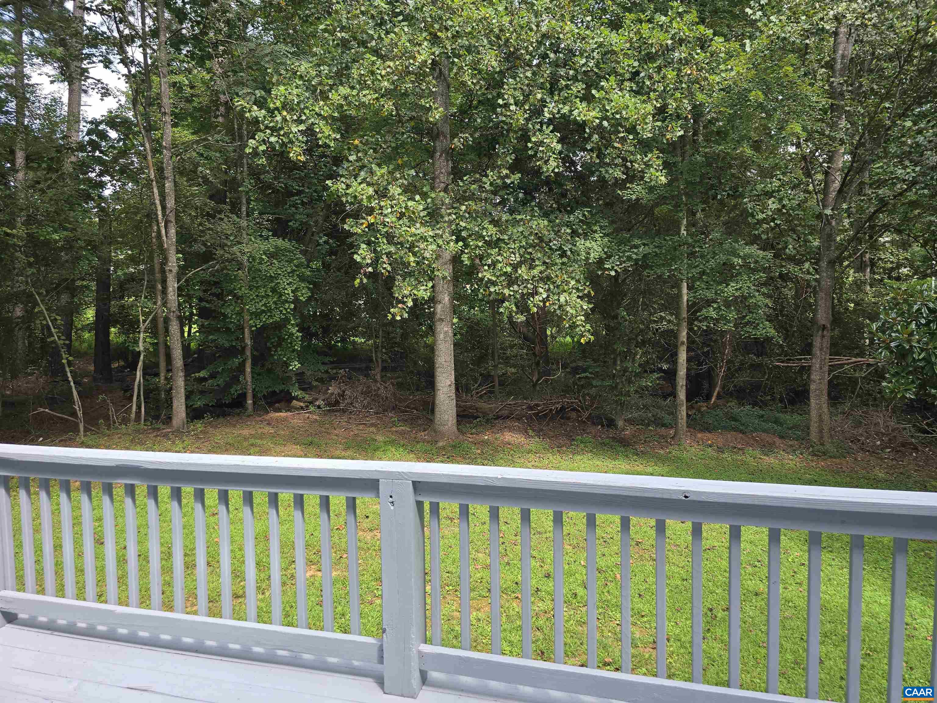 259 Spring Oaks Lane Ruckersville, VA 22968 - Photo 7 of 26 a view of a two chairs in the balcony