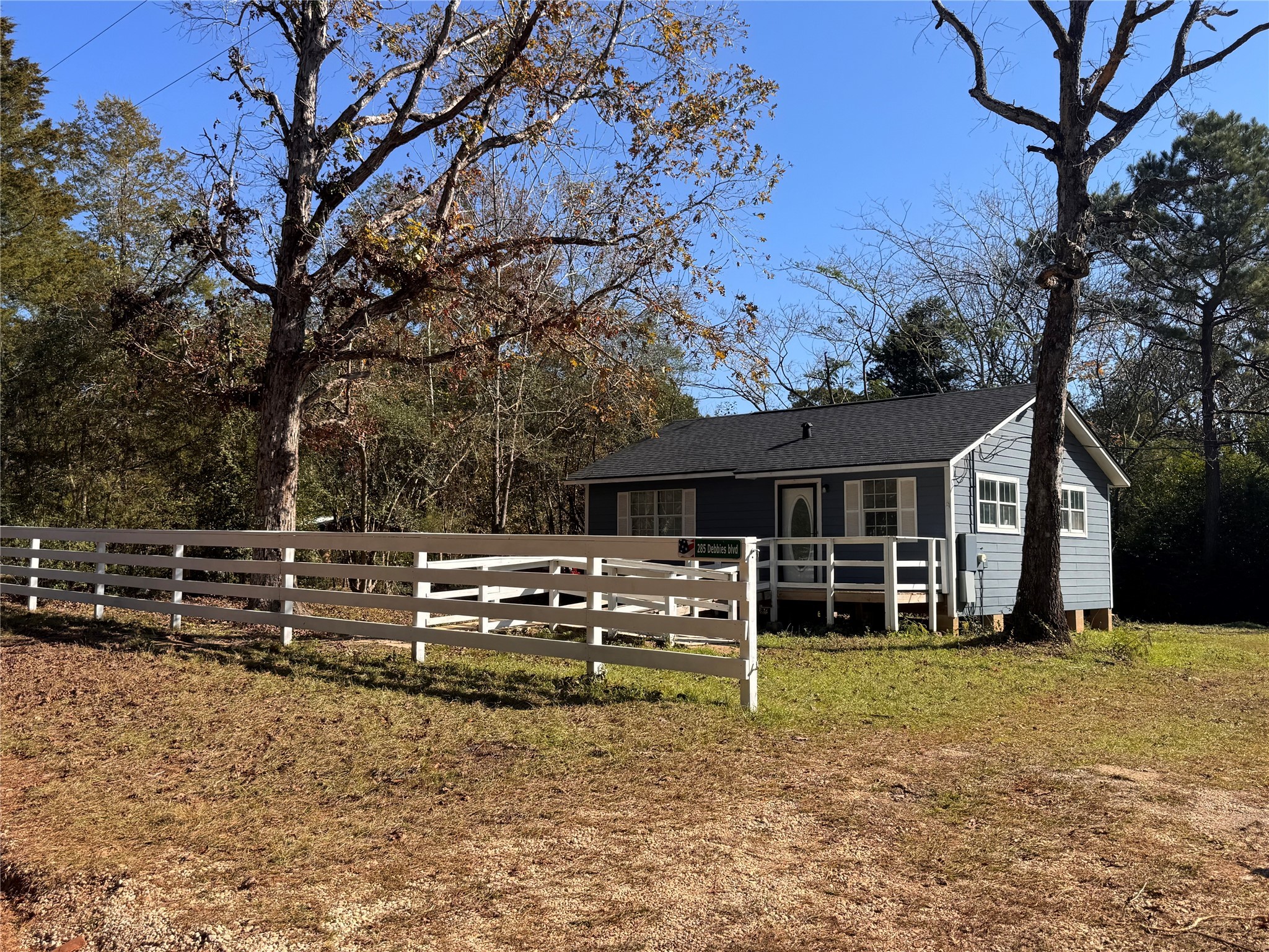 285 Debbies Boulevard Livingston, TX 77351 - Photo 2 of 10 a view of a house with backyard