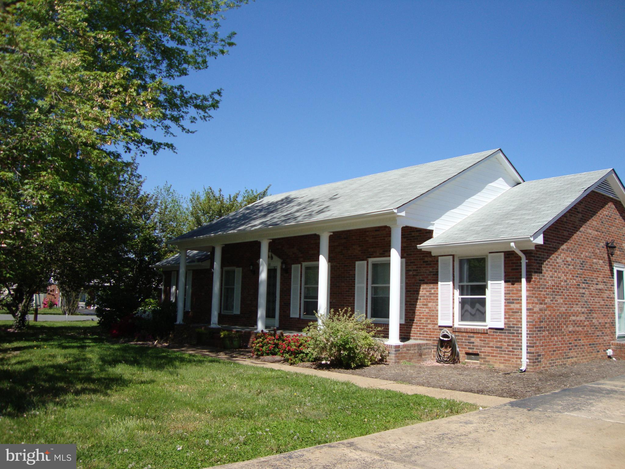 88 Leeland Road Fredericksburg, VA 22405 - Photo 1 of 22 front view of a house with a yard