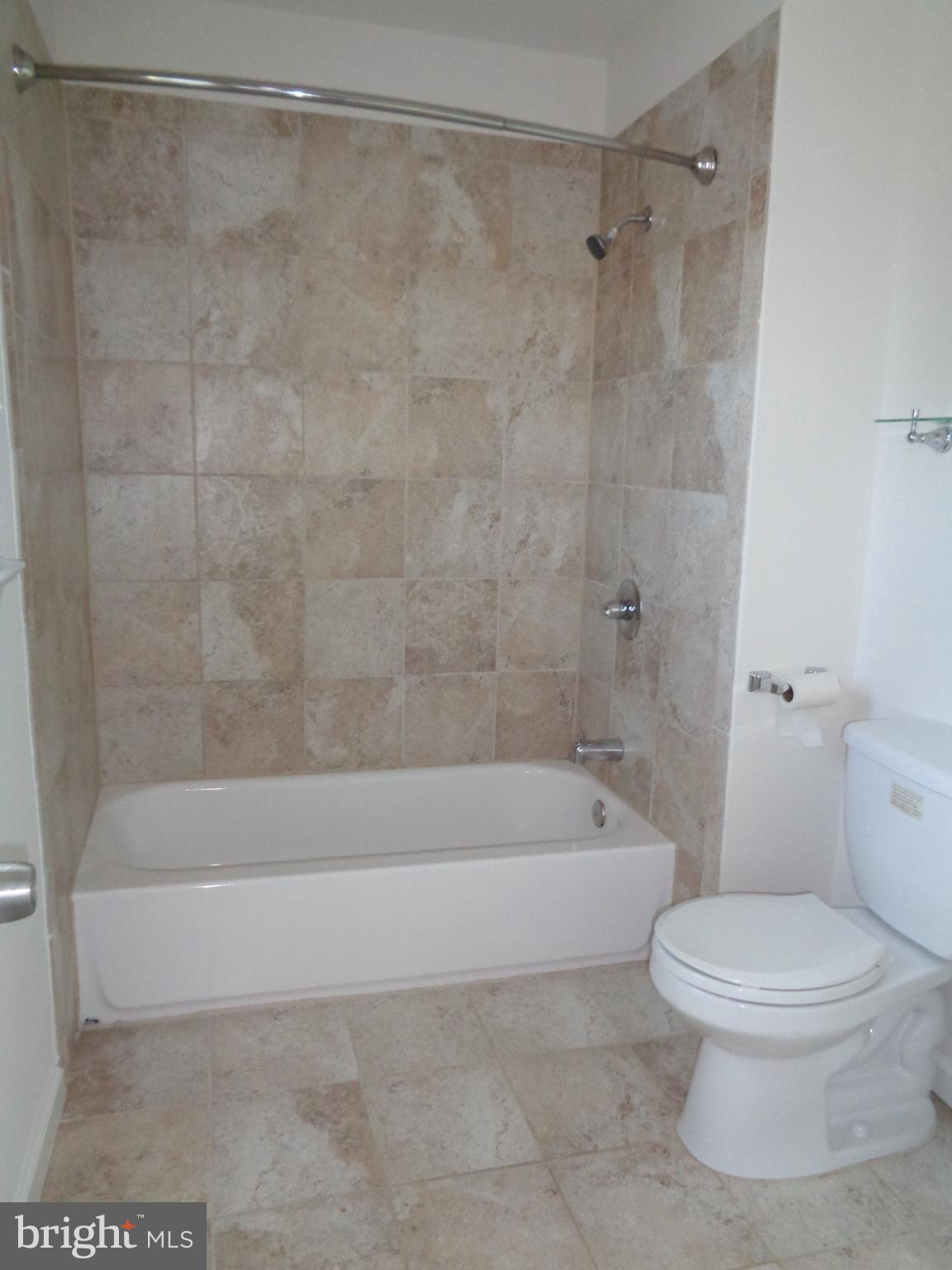 88 Leeland Road Fredericksburg, VA 22405 - Photo 16 of 22 a bathroom with a bathtub and a toilet